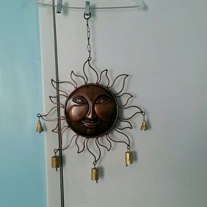 New in pkg. Decorative copper rustic sun windchime